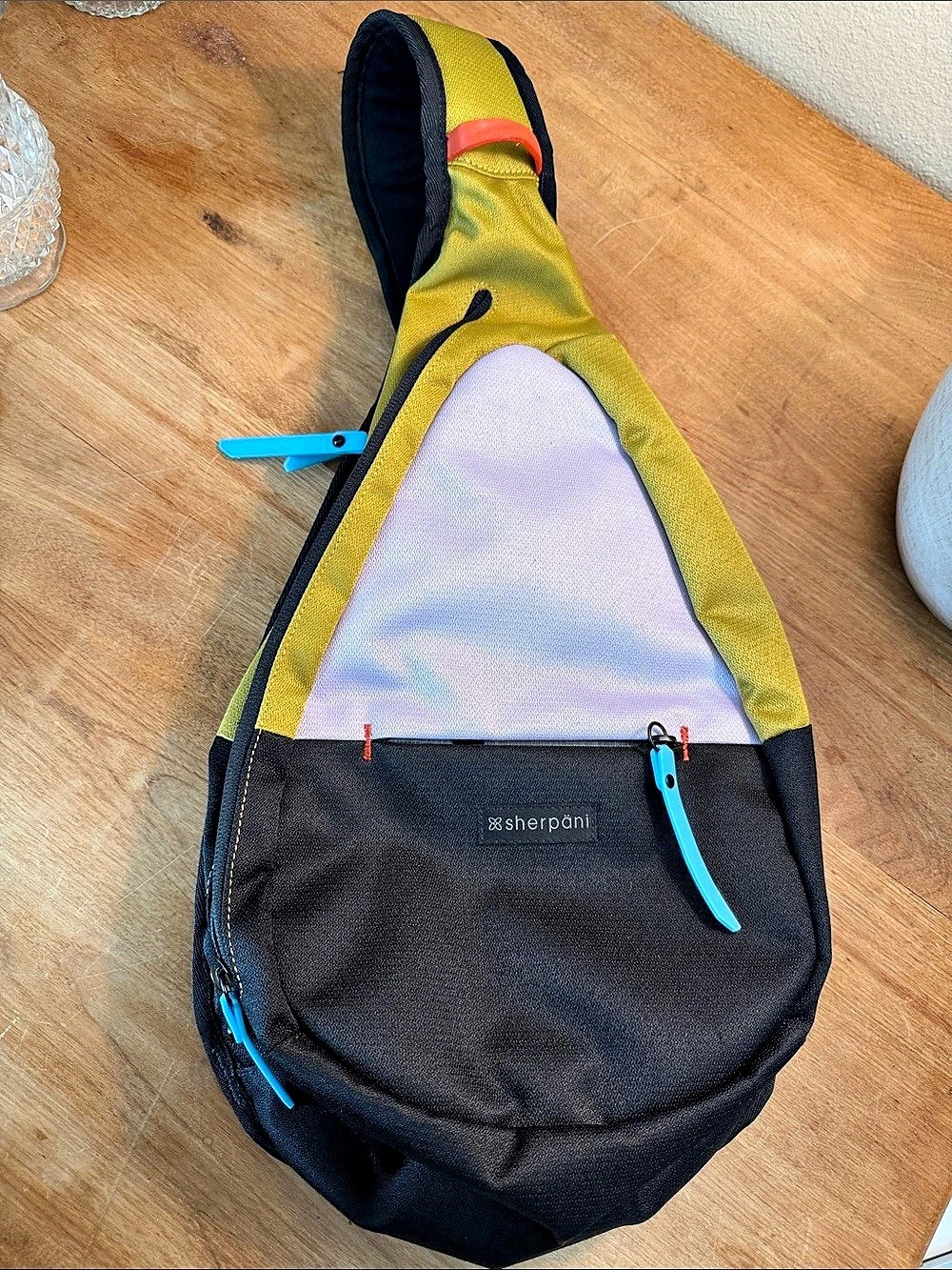 Sherpani Esprit Sling Backpack in Black & green